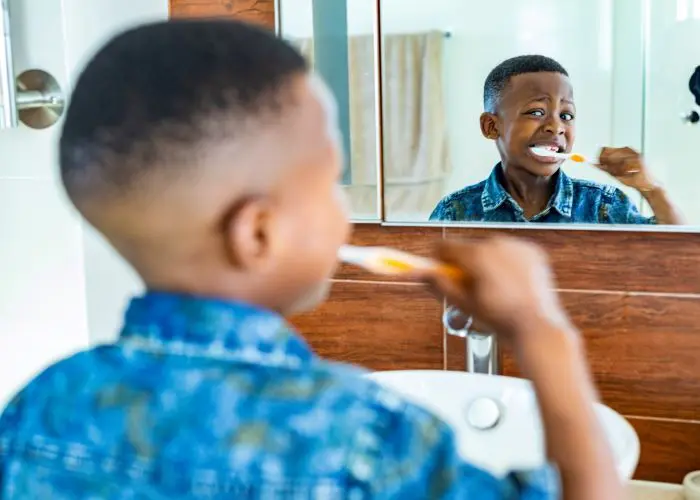 Child Brushing Teeth